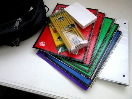 School supplies notebooks pencils backpack binder